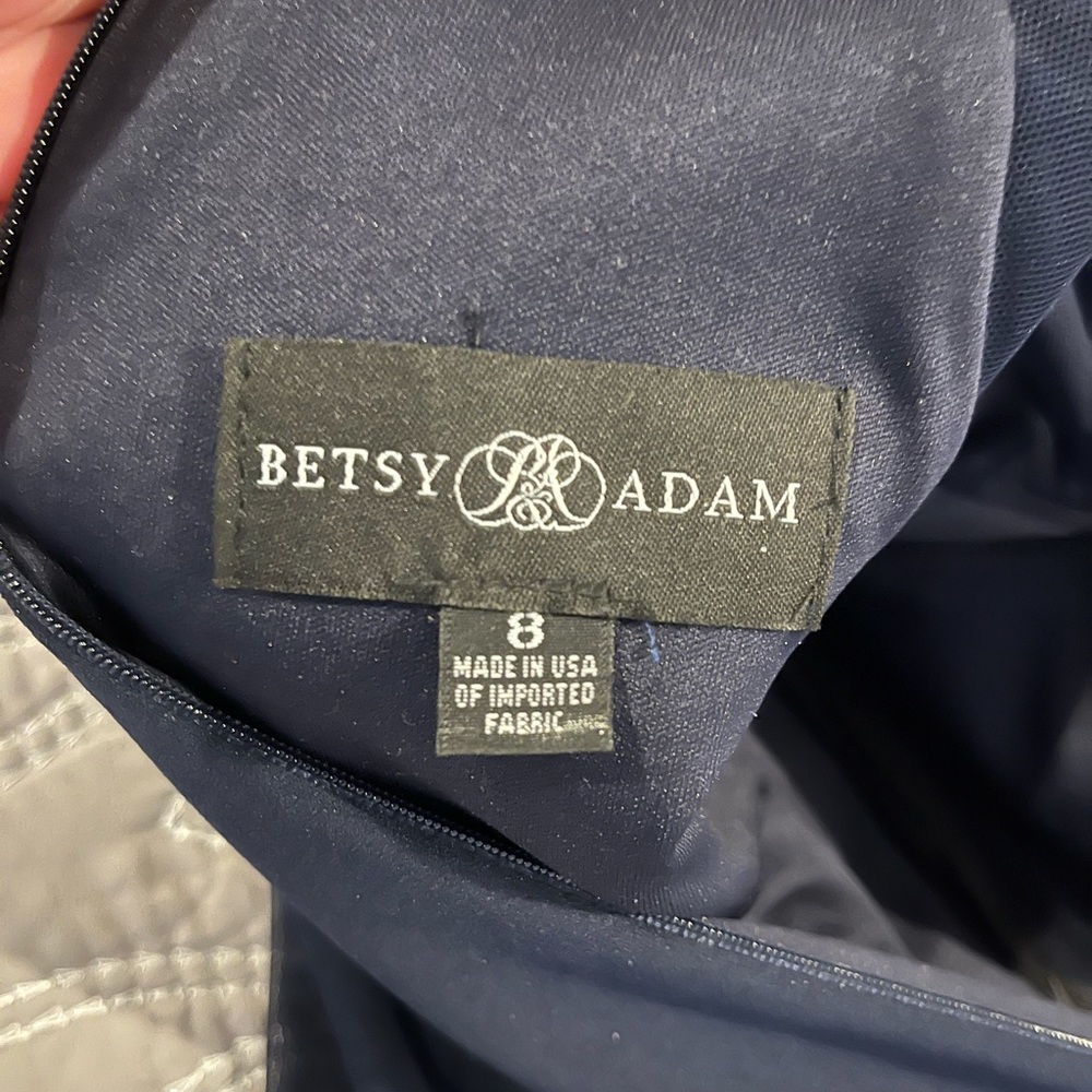 Formal dress. Worn once to a wedding. Navy in color.